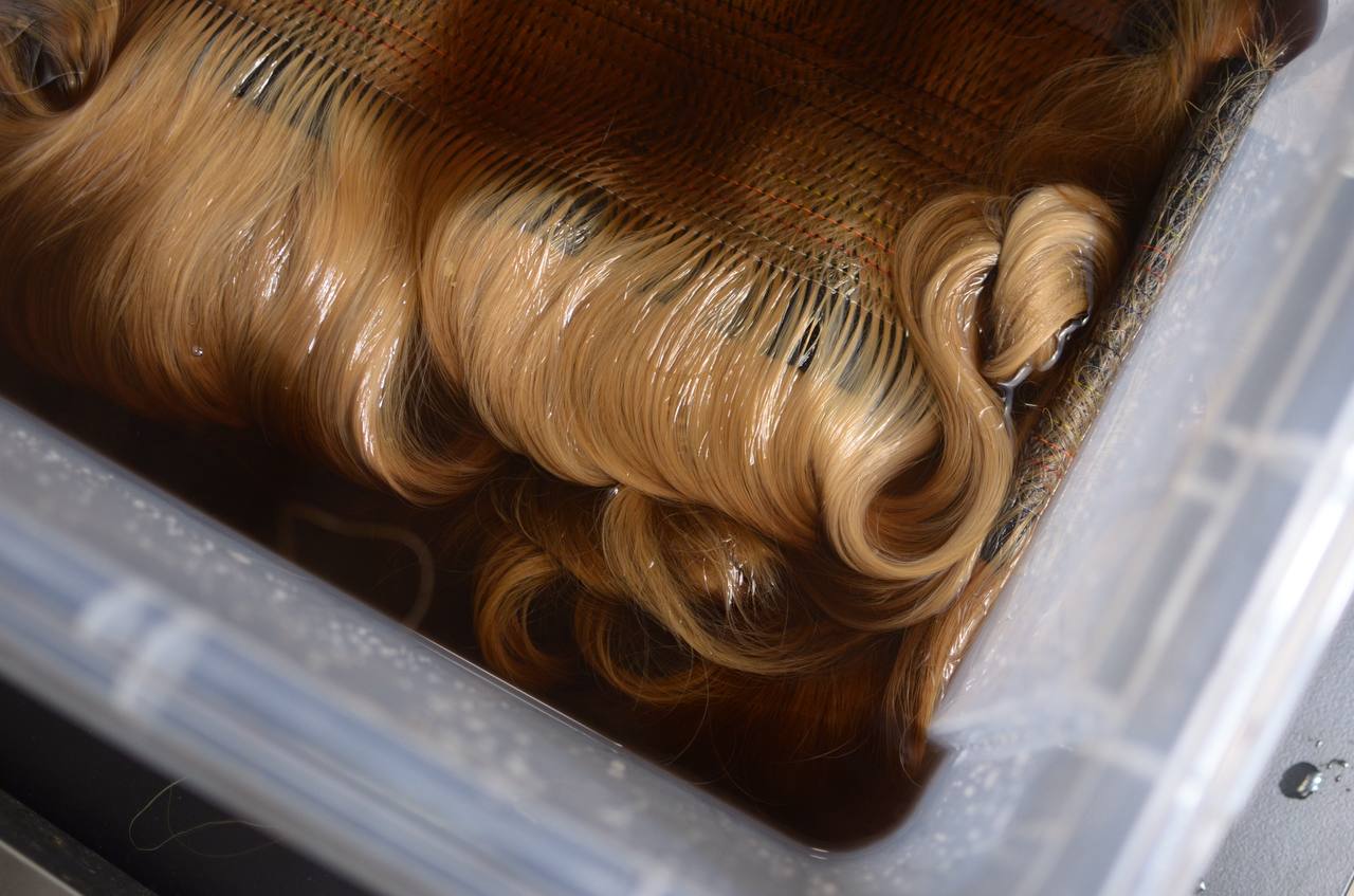 Color bath — hair soaking in the coloring solution